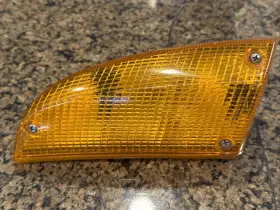 1364679 BMW Left Headlight Turn Indicator Light Lens Lamp E23