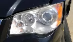 114-01113L CHRYSLER Driver Headlight Xenon Hid Bezel Town