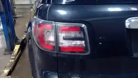 166-02587L GMC TRUCK Driver Tail Light Lid Acadia