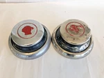 Two 1920's 1930's Pontiac Hubcaps, Unused 8", 1940's Reproductions Wall Hangers. Fixed Price $75.00.