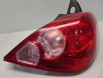 2007-12 Nissan Versa (hatch) Passenger Right Tail Light - Quarter Mounted. Fixed Price $57.84.