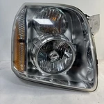Passenger Right Headlight Denali Fits 07-14 Yukon Pa3. Fixed Price $140.00.