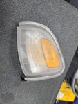 2001-2004 Toyota Tacoma Chrome Trim Park Turn Signal Light - Right Passenger Rh. Fixed Price $15.00.