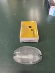 1957 Chevy Nos Delco Guide Clear Glass Back-up Lamp Lens. Fixed Price $44.99.