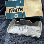 1966 Barracuda Valiant. Left Park Light Lens N O S Mopar. Fixed Price $85.00.