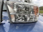 2009-2018 Dodge Ram Factory One Headlights Good Condition. Fixed Price $250.00.