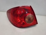 2005-08 Toyota Corolla Drivers Left Tail Light - Quarter Mount. Fixed Price $48.94.