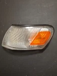 1993-1997 Toyota Corolla Driver Side Turn Signal Housing (depo). Fixed Price $10.00.
