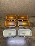 1977-1980 Ford Fiesta Parking Light Lenses (3 Clear/1 Amber) #77fg-15500-ca. Fixed Price $25.00.