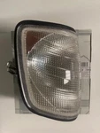 Genuine New 1992-93 Mercedes E W124 Clear Front Right Blinker Light 1248261043. Fixed Price $289.95.