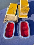 1960-1966 Chevrolet Fleetside Pickup Truck Nos Tail Light Lamp Lens + Bezel Pair. Fixed Price $295.00.